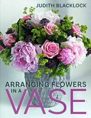 Arranging Flowers In A Vase