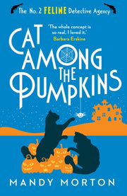 Cat Among The Pumpkins