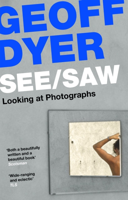 Seesaw Looking At Photographs